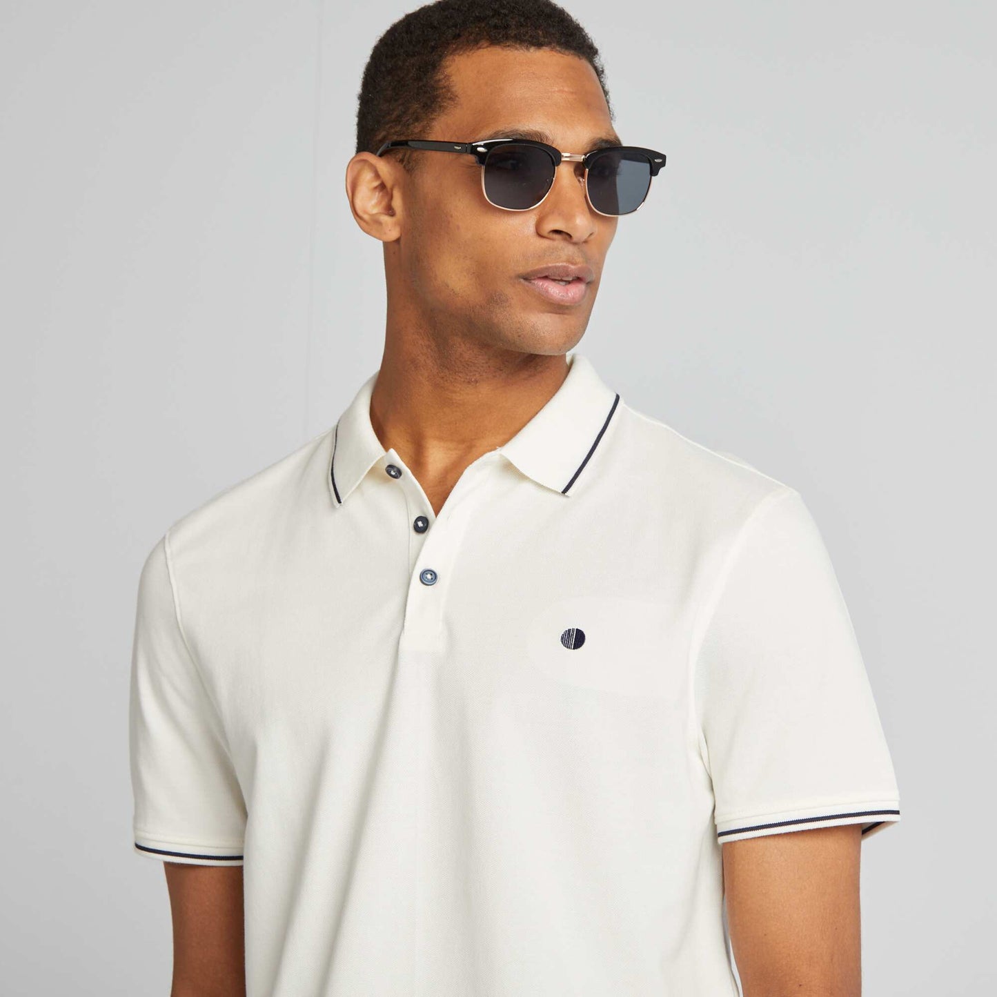 Polo uni en piqué de coton manches courtes BLANC