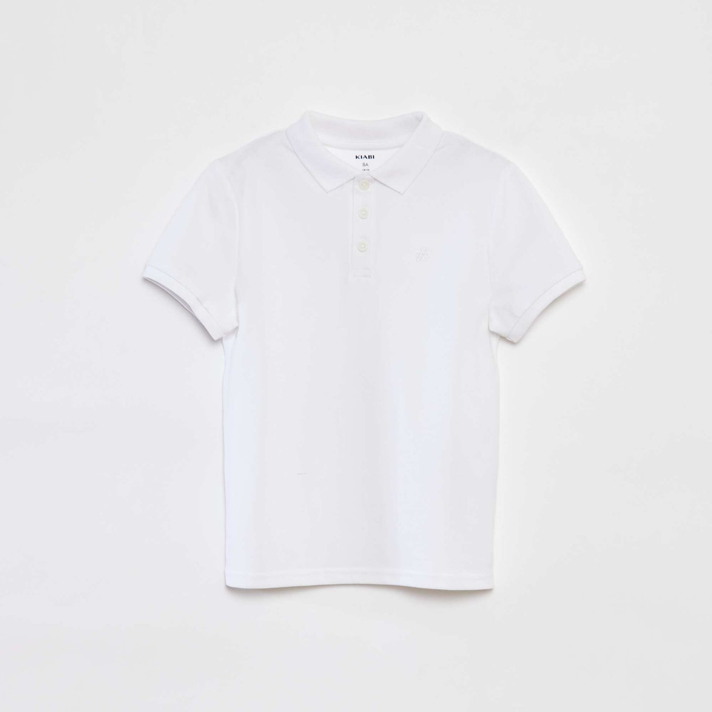 Polo uni en piqué de coton BLANC