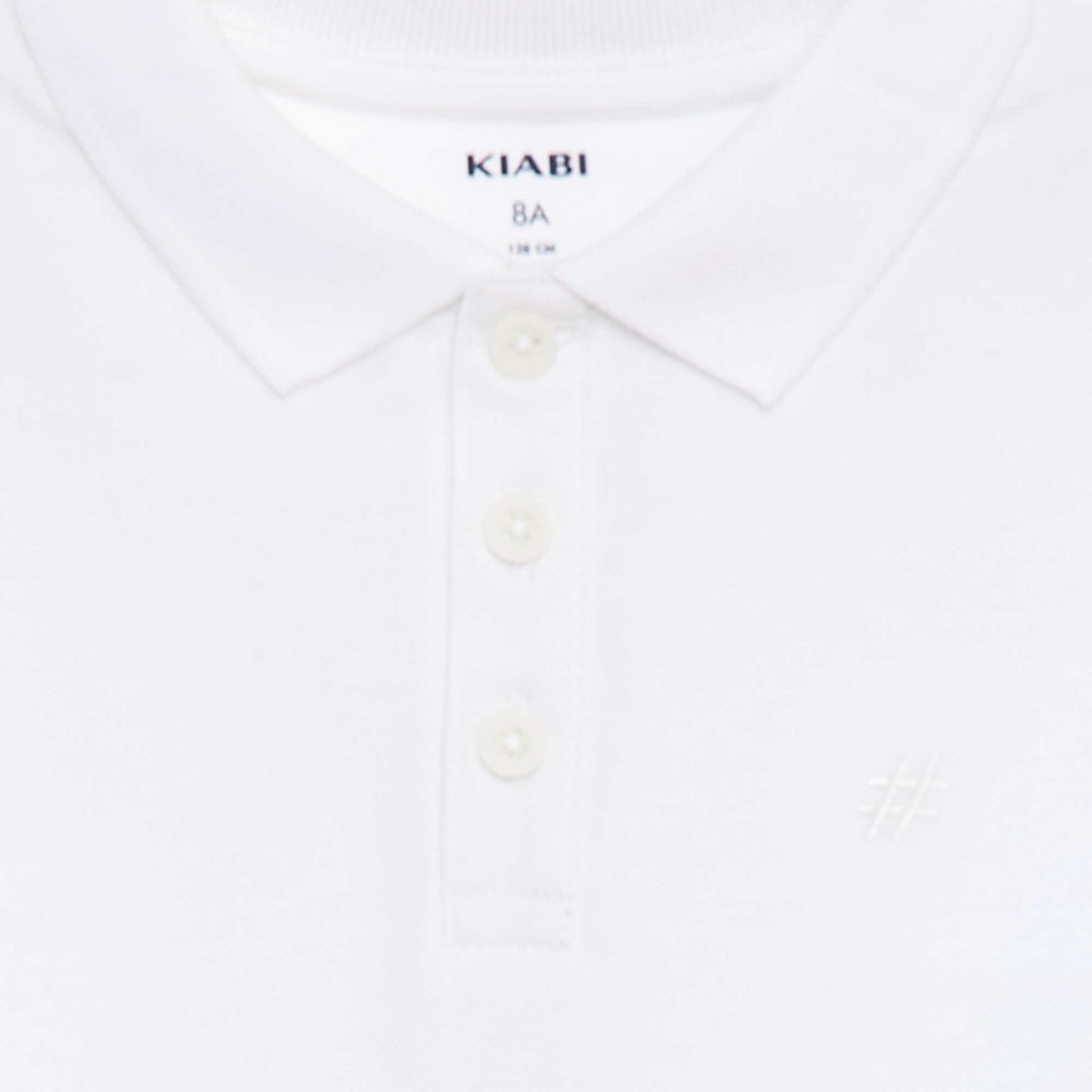 Polo uni en piqué de coton BLANC