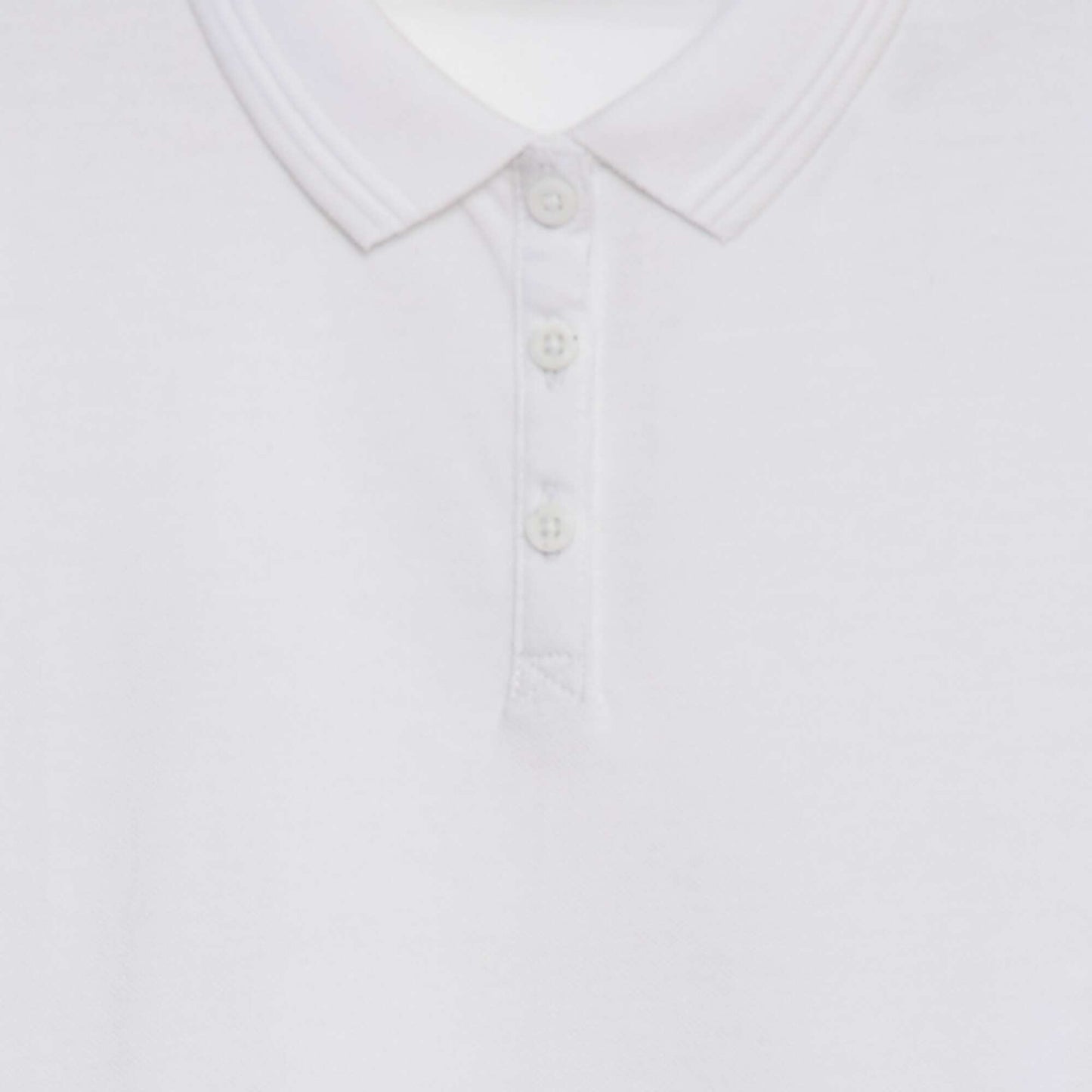 Polo uni en piqué de coton avec manches courtes BLANC