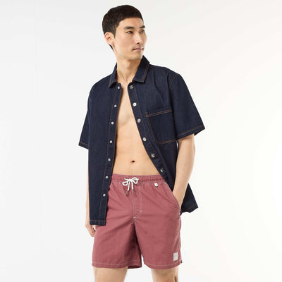 Short de bain uni avec poches ROUGE