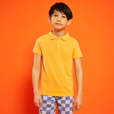 Polo en piqué de coton uni orange abricot
